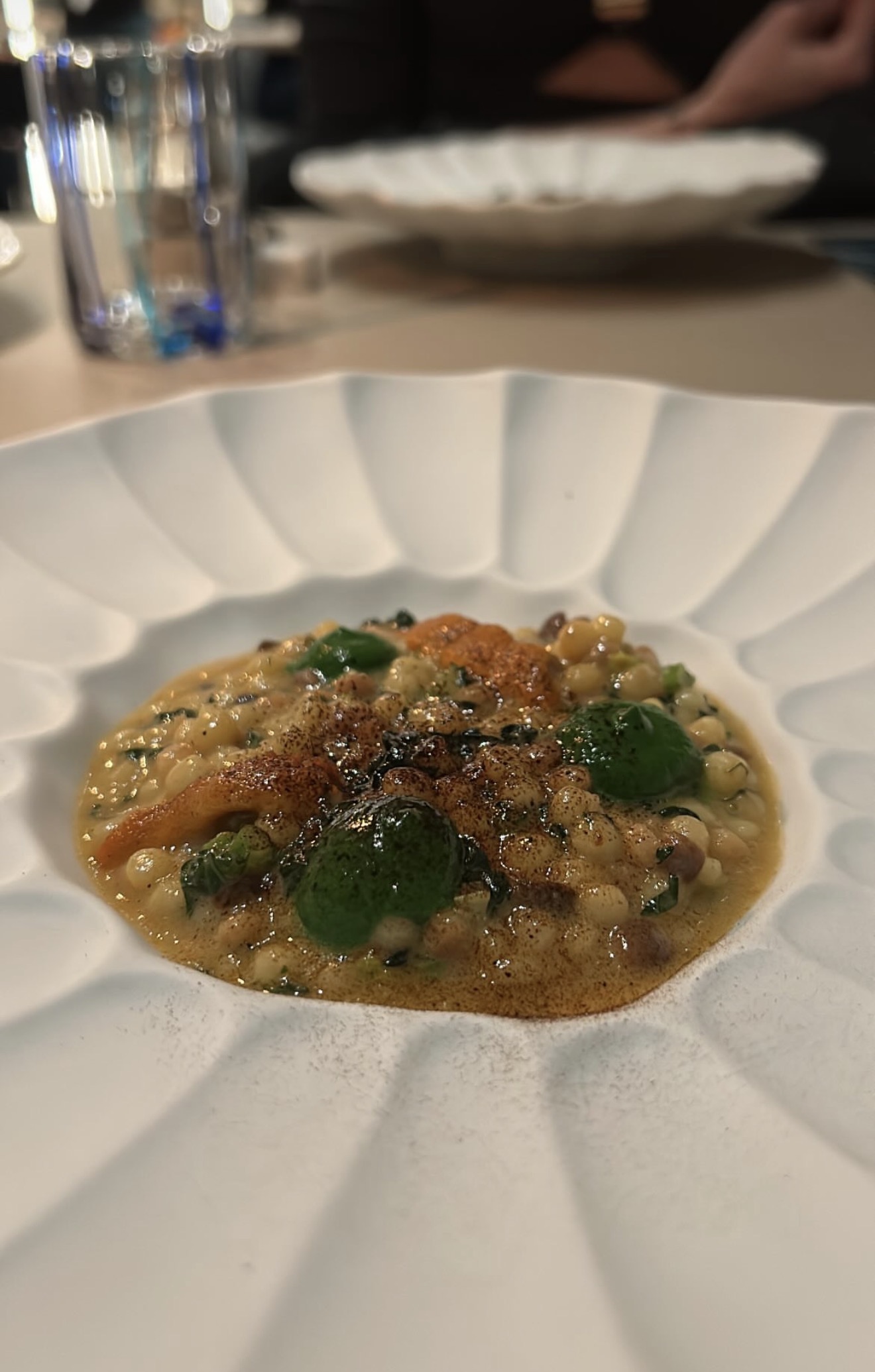 Fregola con crema di zucchina trombette, totanetti e prescinseua
